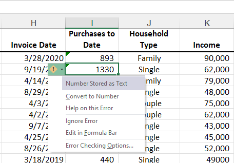 Green triangle in Excel