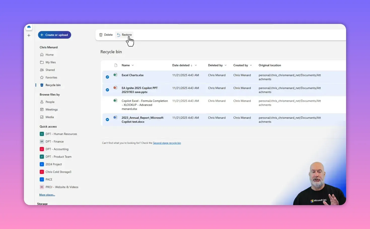 Cursor clicking the Restore button in the OneDrive Recycle Bin toolbar while items are selected.
