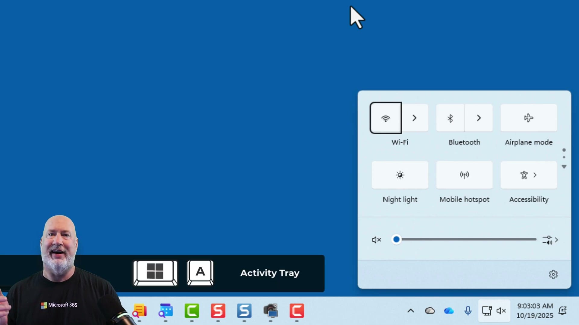 Windows Quick Settings panel showing Wi-Fi, Bluetooth, Airplane mode, Night light, Mobile hotspot, and Accessibility toggles with volume slider